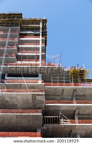 High rise construction site with a concrete structure in the process of being built