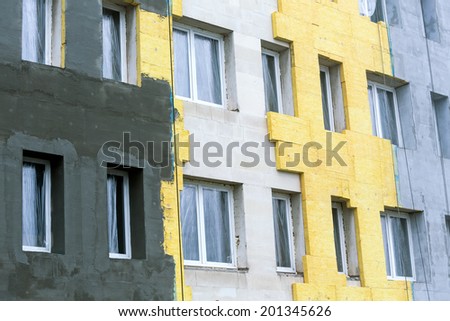 Concrete wall of building with insulation for thermal protection