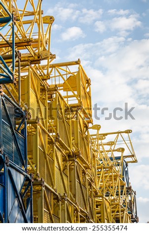 Stacked steel frames of old building cranes