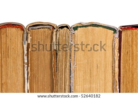 Row of antique books with the torn covers