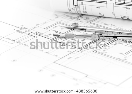 architectural background with plan, blueprint roll and drawing compass