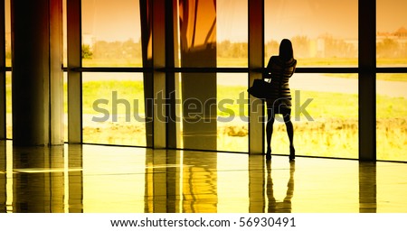 woman at the window at the airport