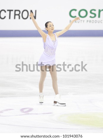 NICE - MARCH 31: Mao Asada of Japan takes a bow as she finishes her free skating at the ISU World Figure Skating Championships, held on March 31, 2012 in Nice, France