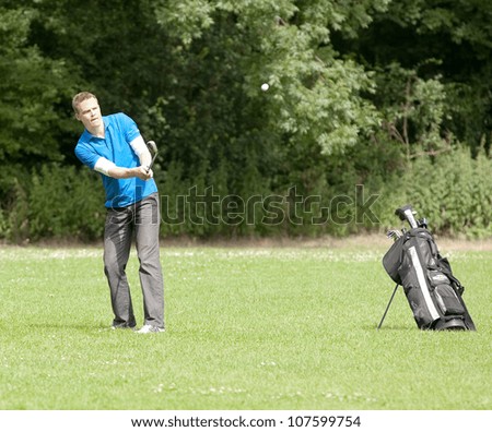 AMSTERDAM - JULY 11: Unidentified golfer participates in AH&BC Open, golf charity event, held in the Amsterdamse Bos, on July 11, 2012 in Amsterdam, The Netherlands