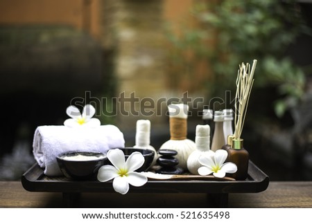 Spa massage compress balls, herbal ball on the wooden with treaments spa , Thailand, select focus