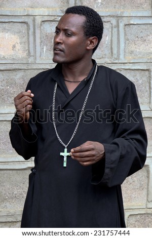 TURMI, ETHIOPIA - NOVEMBER 22, 2011: The priest from the Ethiopian orthodox church. November 22, 2011 in Turmi, Ethiopia.