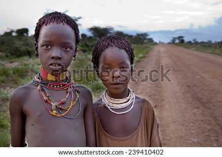 SOUTH OMO - ETHIOPIA - November 23, 2011: Unidentified Hamer girls on November 23, 2014 in South Omo, Ethiopia. The girlss portrait from a tribe a hamer, Ethiopia.