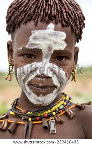 SOUTH OMO - ETHIOPIA - November 24, 2011: Unidentified Hamer boy on November 24, 2014 in South Omo, Ethiopia. The boy\'s portrait from a tribe a hamer, Ethiopia.