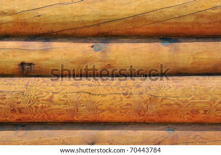 New wooden logs wall of rural house background