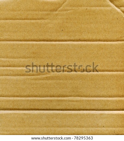 Textured recycled cardboard with natural fiber parts
