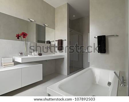Modern Bathroom With Masonry Shower Cubicle And Bathtub