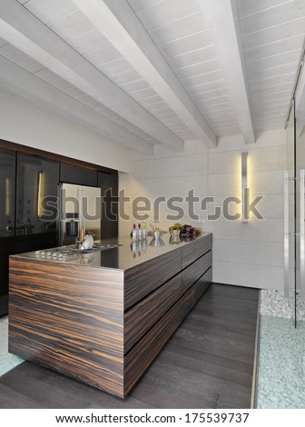 Modern Kitchen With Wood Floor And Wood Ceiling