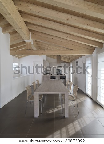 wood dining table in the modern dining room with wood ceiling