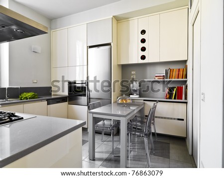 modern kitchen with table in the center