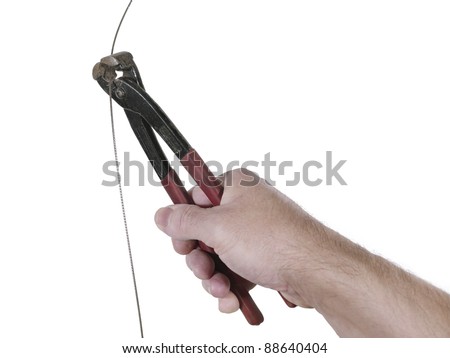 man who cuts  a wire isolated on the white background