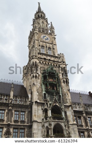 Low angle view of old town hall clock tower in Munich, Bavaria, Germany.