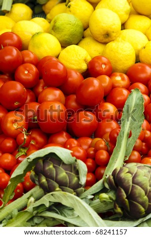 The image was shot in Paris. A lot of colorful vegetable was selling in Vegetable market.