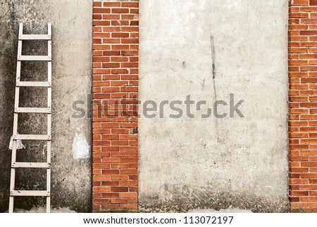 old, weathered brick wall background, ladder on the left side