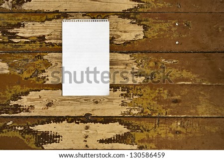 note on the grunge plank wall background