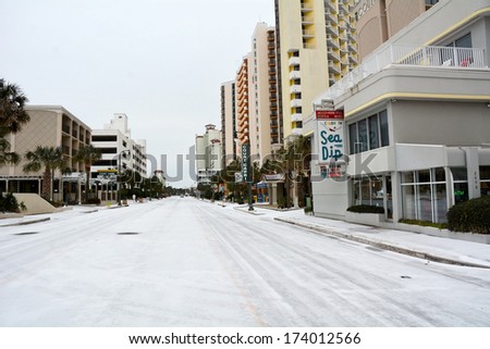 MYRTLE BEACH - JANUARY 29: Very rare Winter storm Leon hits South and virtually shuts down the beach resort of Myrtle Beach South Carolina, January 29, 2014.