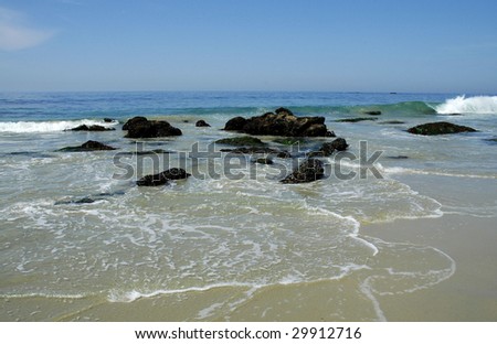 Pacific Ocean surf with with rocks, Laguna Beach