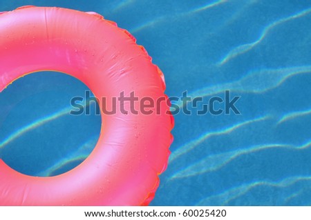 Pink pool float / pool ring room for your text.