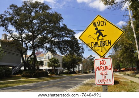 slow children caution sign on a street