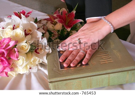 stock photo wedding hands bible