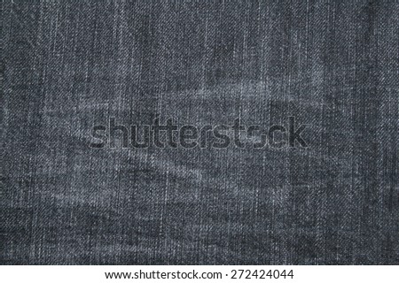 Black stone-washed Jeans denim cloth, material closeup