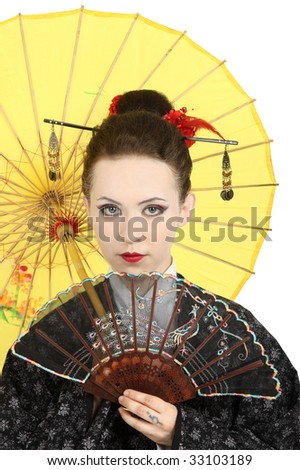 The Japanese geisha on a white background with a fan and an umbrella