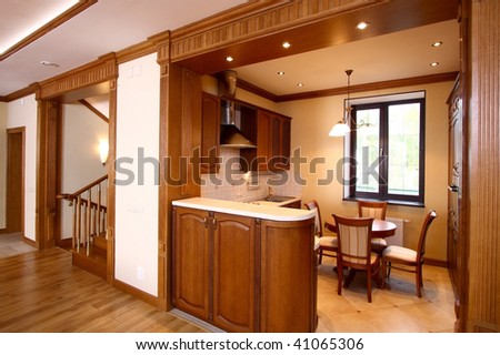 Kitchen with furniture from a natural tree