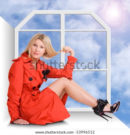 The beautiful girl sits on a window sill a back to a window. Behind a window the sun in the dark blue sky with clouds.