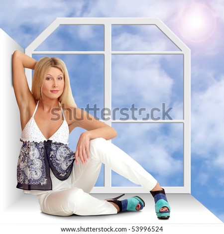 The beautiful girl sits on a window sill a back to a window. Behind a window the sun in the dark blue sky with clouds.
