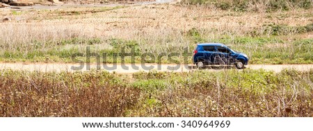 Car on country side road