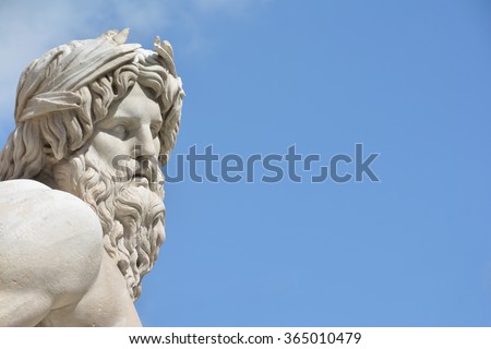 Marble head of River Ganges statue as a greek god, detail from baroque Fountain of Four River in the center of  Piazza Navona Square, Rome (17 th century)