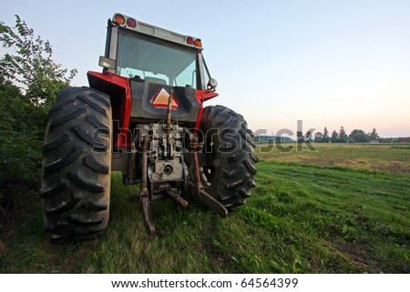 a tractor parked on grass