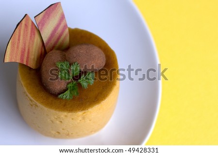 Almond and Mango Mousse (top view yellow background)