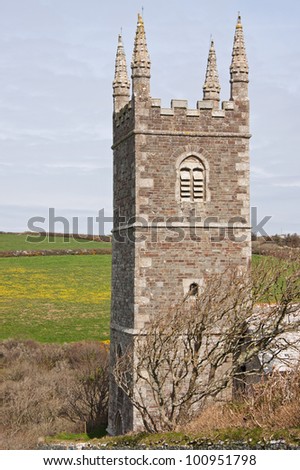 The tower of the thirteenth century parish church of St Morwenna and St John the Baptist at Morwenstow in North Cornwall UK
