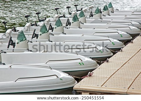 Fleet of moored pleasure boats on a French lake