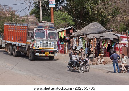 MADHYA PRADESH, INDIA - FEBRUARY 28, 2015: A rural truck stop at Kanchana. The vast number of motor vehicles on Indian roads means there are many such service halts throughout the countryside