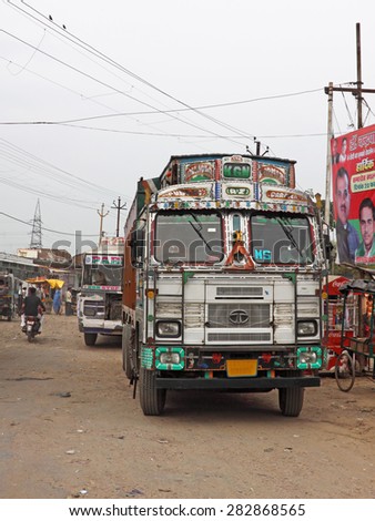 MADHYA PRADESH, INDIA - FEBRUARY 28, 2015: Scene at a rural truck stop at Kanchana. The large number of trucks on Indian roads means there are many such service halts throughout the countryside