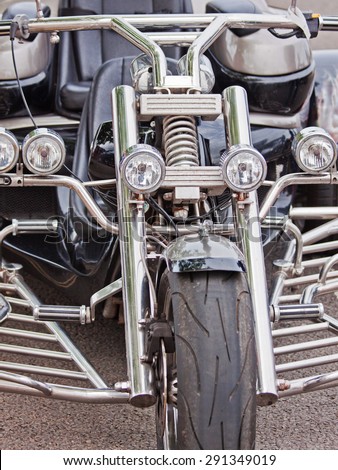The chromed chassis of a motorcycle displayed at a bike rally in UK