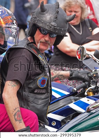 BIDEFORD, ENGLAND - MAY 30, 2015: An unidentified participant at the town\'s Bike Show which is held annually to support local charities and attracts around 2,000 bikes