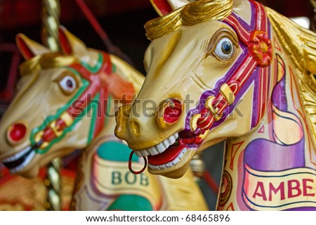 Colorful merry-go-round horse rides