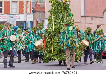 BRISTOL, ENGLAND - MAY 7: The Jack in the Green parade passes through Bristol, England on May 7, 2011. The medieval custom celebrating the onset of summer has recently been revived in the city
