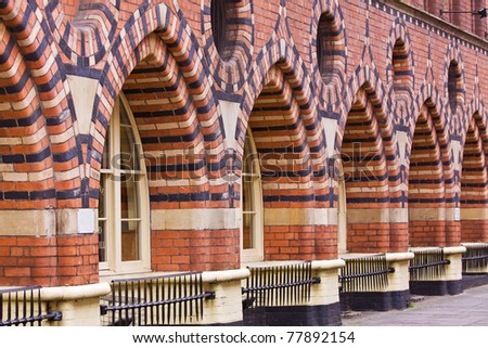 Ornate brick arches of a nineteenth century building formerly used as a granary in Bristol UK