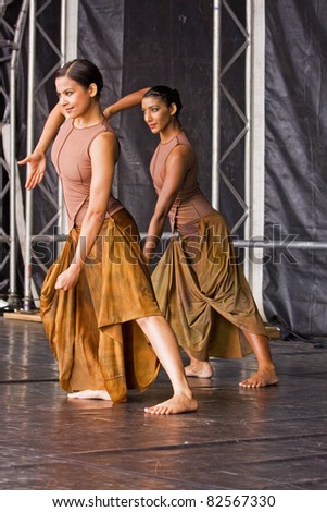 BRISTOL, ENGLAND - JULY 30: Classical Indian dance performed by Atma in the Dance Village at the Harbour Festival in Bristol, England on July 30, 2011. The event attracted a record 280,000 spectators