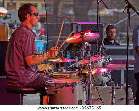 BRISTOL, ENGLAND - JULY 31: Drummer in the Pete Josef band on the Queen Square stage at the Harbour Festival in Bristol, England on July 31, 2011. The three day event attracted 280,000 spectators