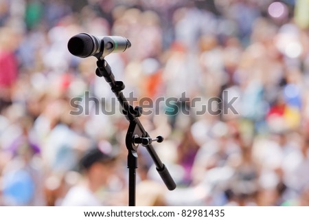 Microphone awaiting the next performer at an outdoor concert