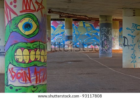 BRISTOL, ENGLAND - JANUARY 8: Graffiti in an inner city underpass in Bristol, England on January 8, 2012. The city is renowned for its street art